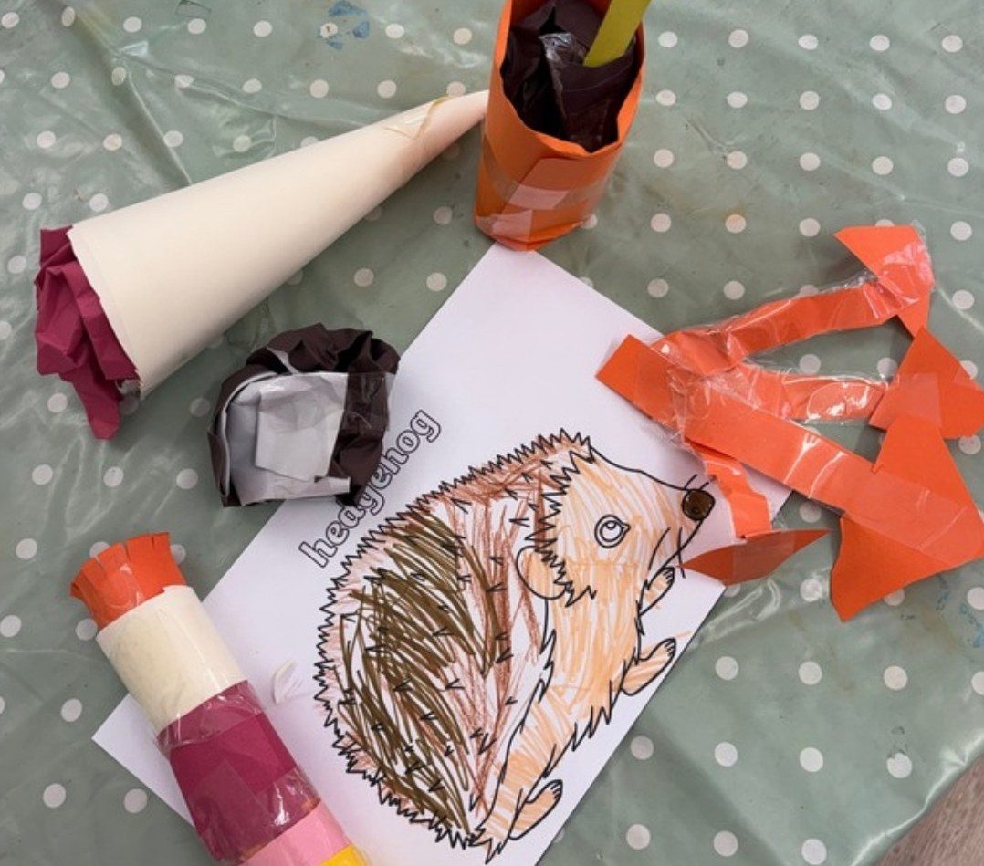 A hedgehog colouring sheet with autumn crafts