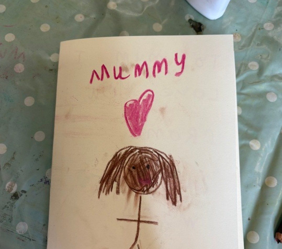 A hand-drawn card that says Mummy